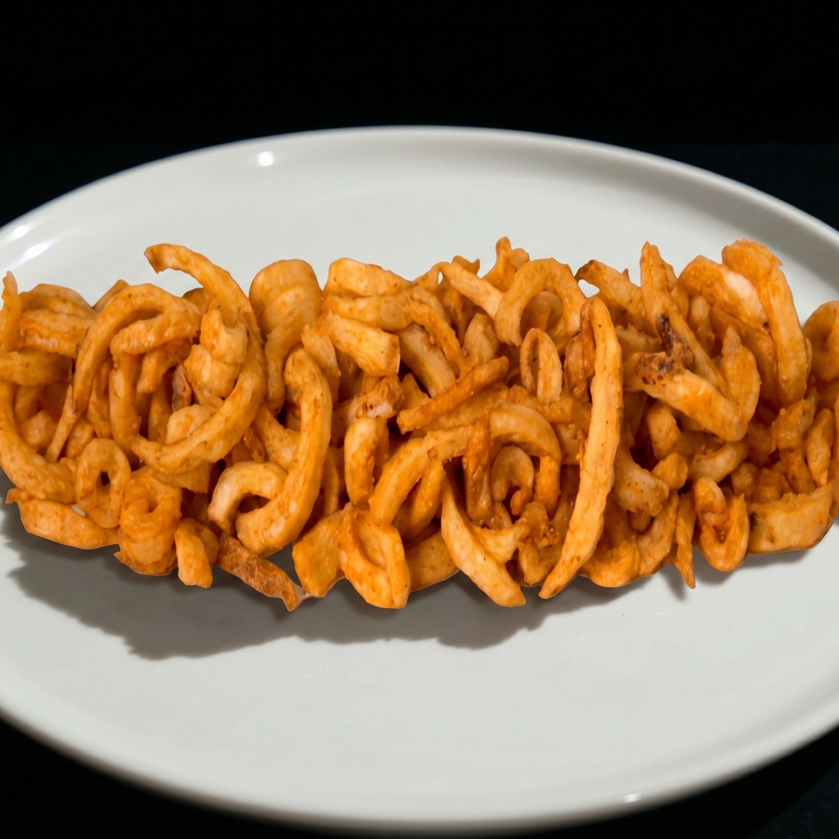 Seasoned Curly Fries.